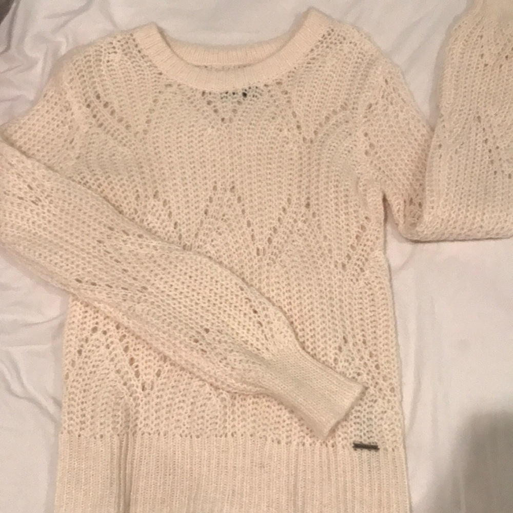 Cream sweater never worn. Cuffed sleeves